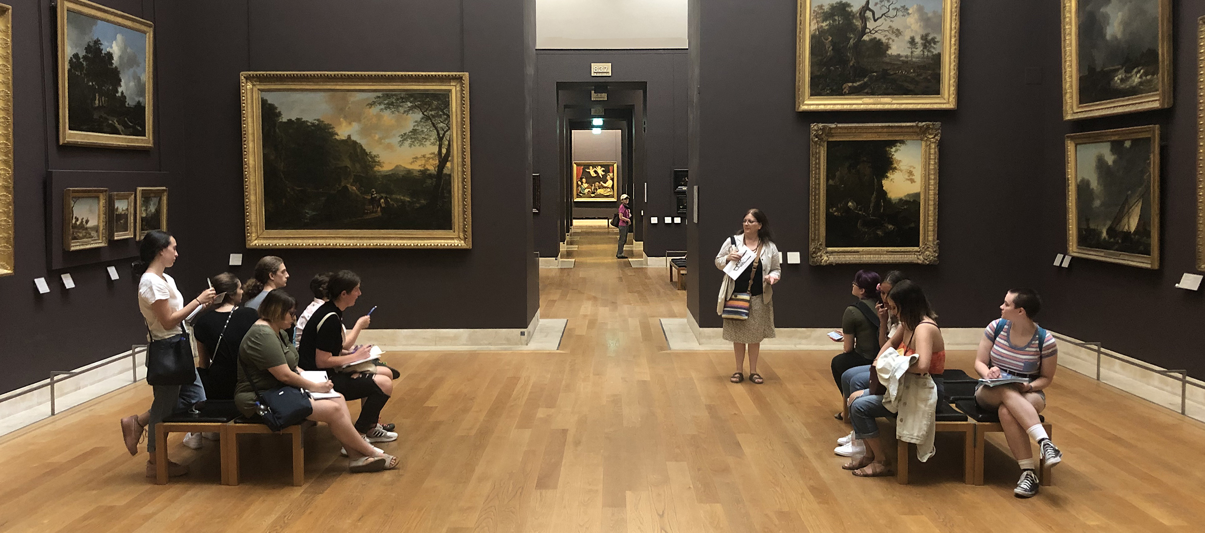 Students study landscape painting at the Louvre in Paris