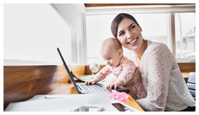 woman with child at a computer